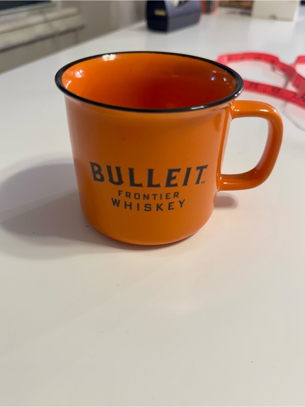 Orange Enamel Camp Mug - Frontier Whiskey Logo